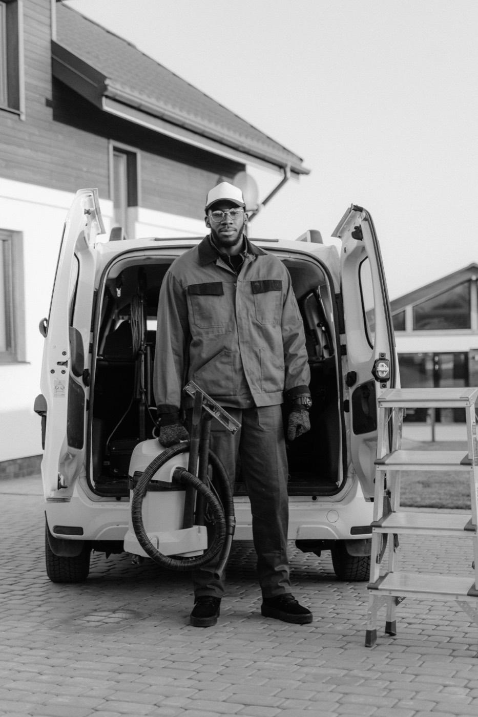 Broward AC Guys technician with a fully stocked service van, ready for same-day AC repair